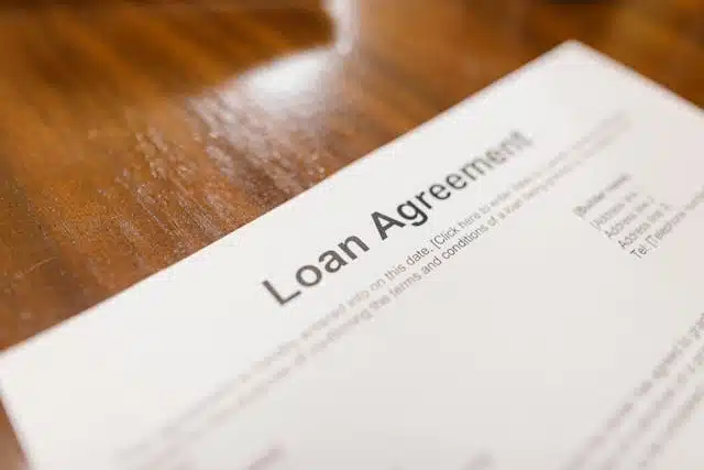 A loan agreement for a car title pawn showcasing repayment term 